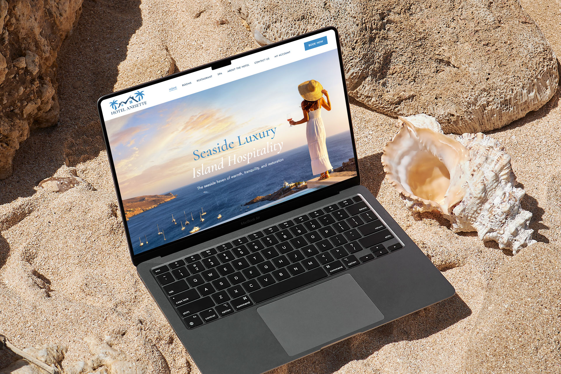 Macbook Display of Hotel Anisette on Beach