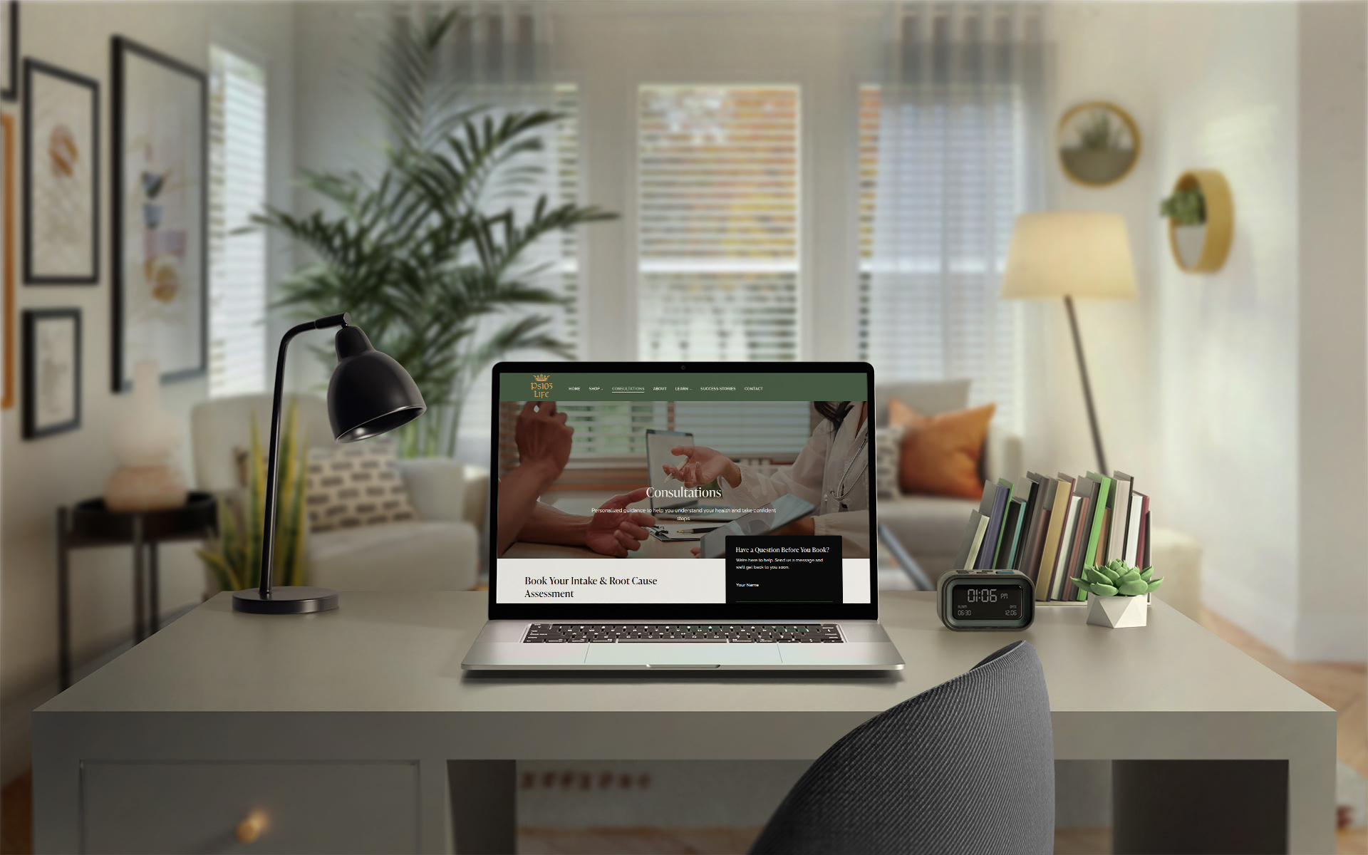 Ps103 Life Consultations page displayed on laptop in home office